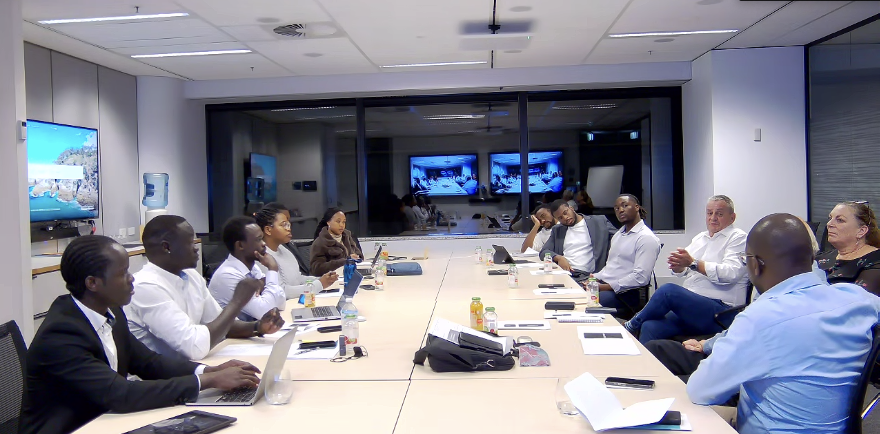 Cohort presenting during a board meeting